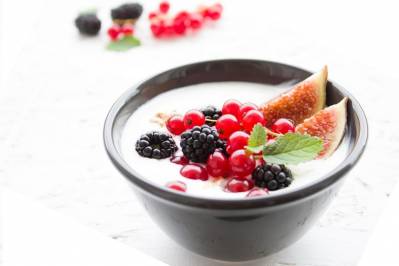 Delicious yogurt with berries in a cup