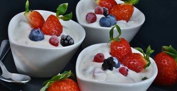 Yogurt with strawberries, currants, blueberries and blackberries